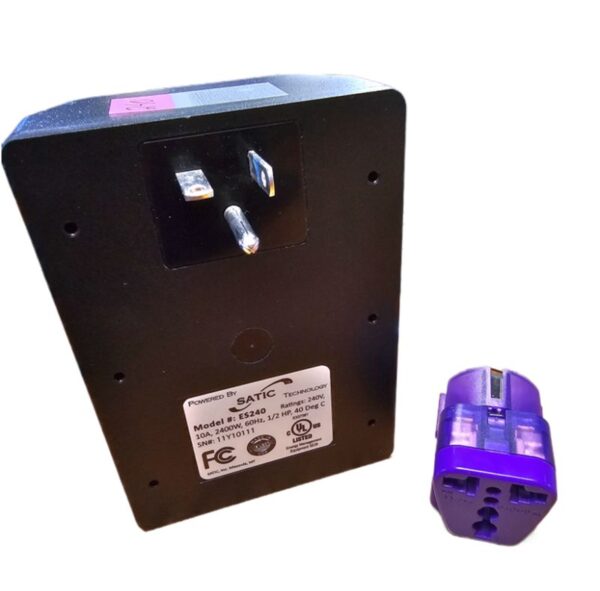 240-volt Pure Power Dirty Electricity Filter by Satic with purple adapter, back showing prongs