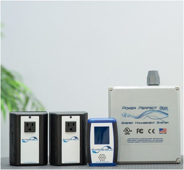 Package deal: Power Perfect whole-house filter, 2 Satic Pure Power Plug-in Filters, Dirty Electricity Meter--background